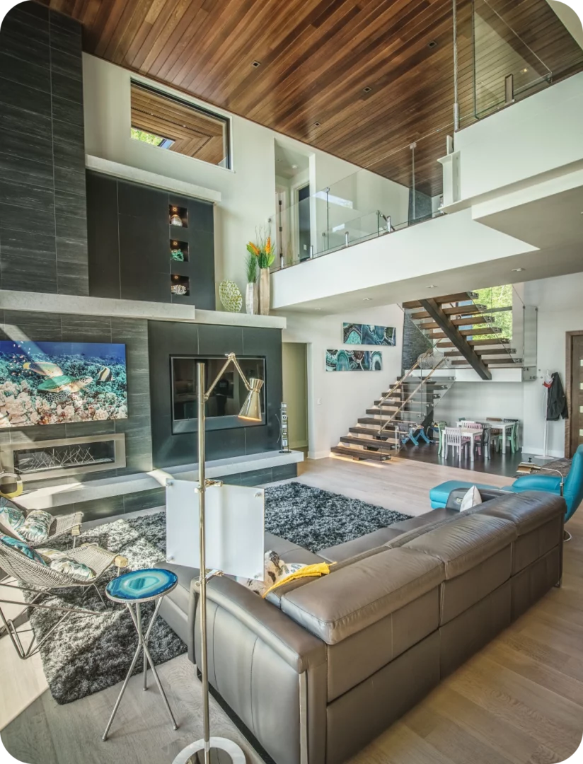 a living room with a couch and a fireplace